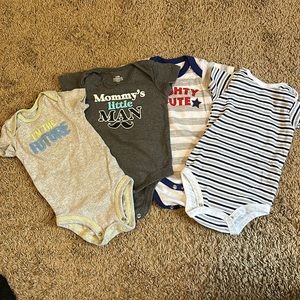 4 ok Onsies 3-6 months.